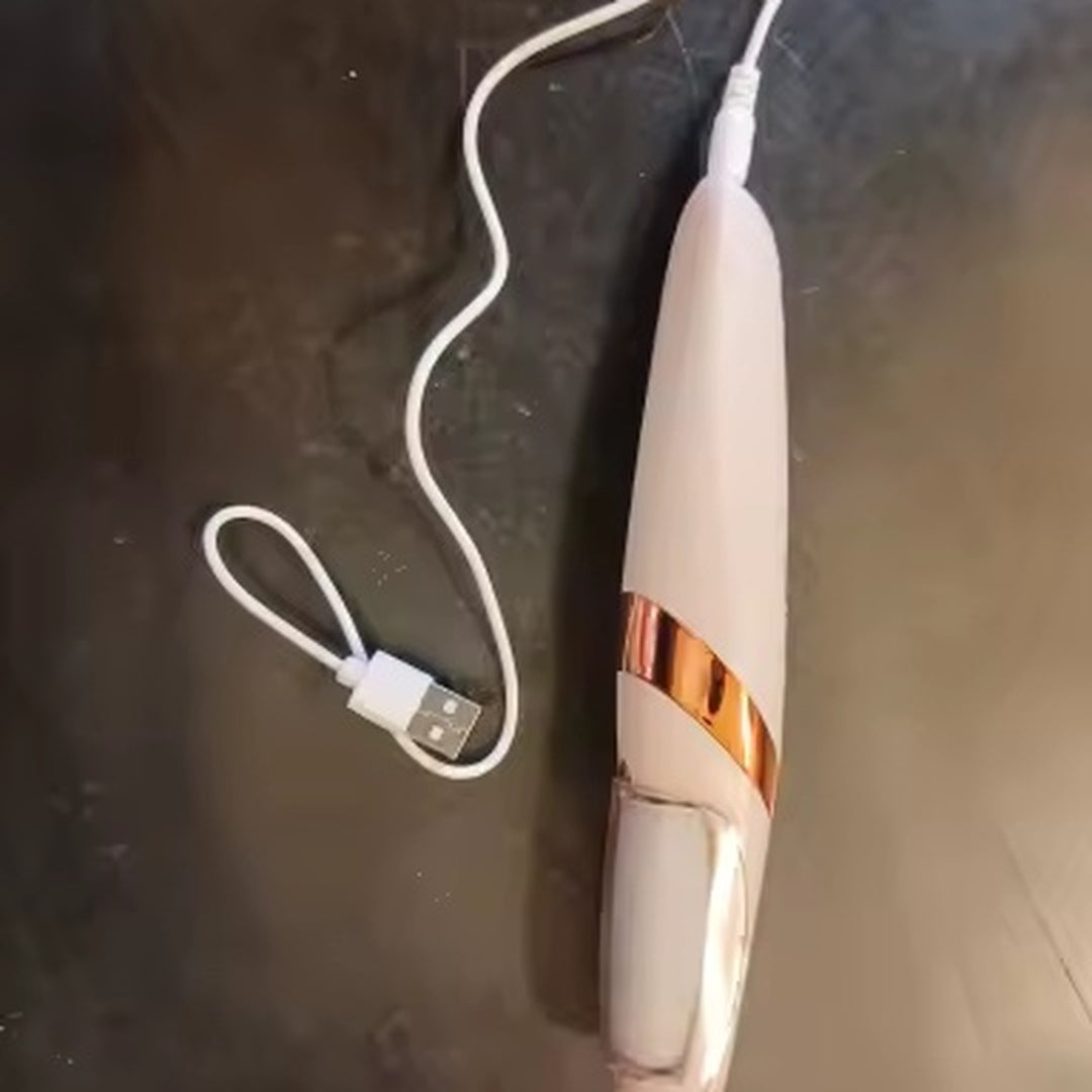 Quitacallos eléctrico Cozzy enchufado con su cable de carga USB